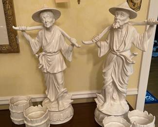 Tall pair blanc De Chine water carriers