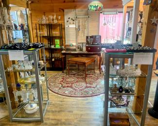 Glass & metal display shelves.  Lots of jewelry