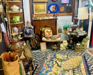 Pictures, glassware, mirrors, candles, unique decor including peacock rug