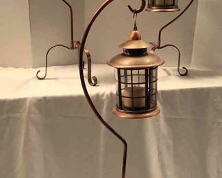 Trip Of Copper Tone Lanterns