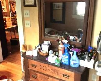 Victorian Dresser & Mirror in the upstairs bathroom...you will not believe how much treasures are in this room.
