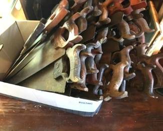 Extensive collection of antique tool...this is just a portion of the hand saws available....