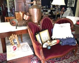 Victorian triple back settee sofa.  yes that is an antique copper moonshine still (instructions not included, LOL)