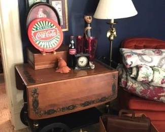 Fun 1950 wood tea/beverage cart and a lot of Coca Cola Coke collection all throughout the house.