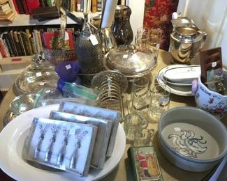 Vintage and collectible barware, silver and silver plate all throughout the home