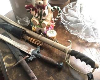 Swords and lots of military items, radios and uniforms 