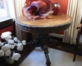 Carved oat table with parquetry top 