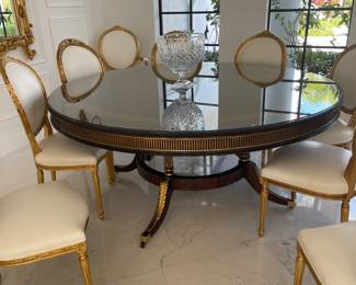 round 60 inches dining room table and 8  chairs. Elegance at its finest