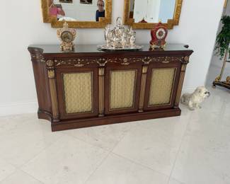 this beautiful breakfront is made by the famous manufacturer E.J. Victor