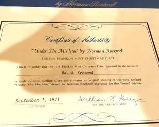 "Under the Mistletoe"  by Norman Rockwell