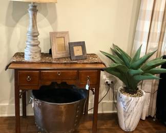 Side table; one of two matching lamps; planter; artificial plant