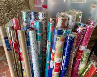 Lots of wrapping paper -unopened