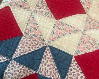 Red, Blue, White and Purple Patchwork Quilt