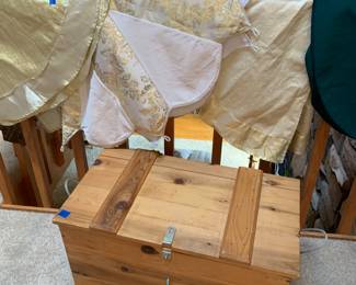 Rustic trunk and tree skirts.
