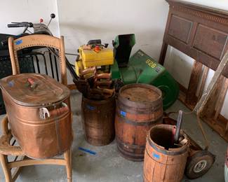 Carved handle saw, barrels, John Deere snowblower. All priced to sell.