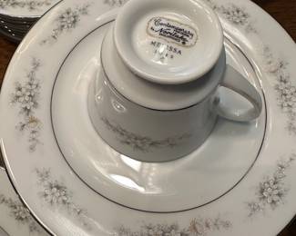 "Noritake" China set "Melissa" with silver rim and subtle floral motif