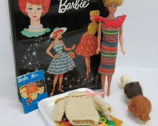 Several Barbie, Midge and Skipper dolls with many tagged clothes