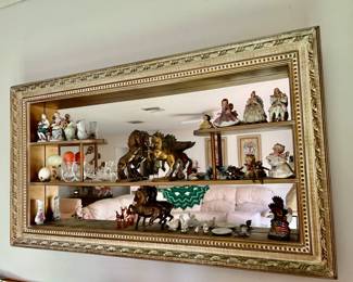 Mcm mirrored wall shelf with figurines