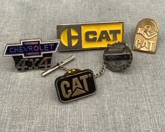 CAT pins, including one sterling silver 15 year service