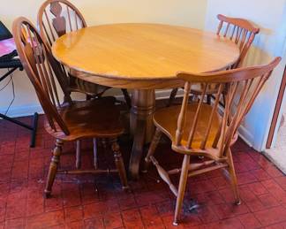 $180 Round oak table 48"D + 4 chairs 
