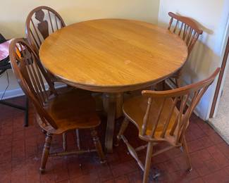 $180 Round oak table 48"D + 4 chairs 