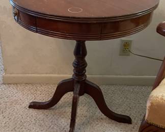 $50 Round tambour table 
