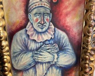 Framed vintage painting of clown.