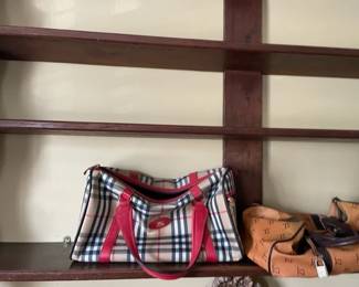 Assorted duffle bags.