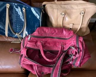 Assorted duffle bags.