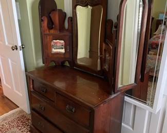 Antique batwing dresser and mirror.