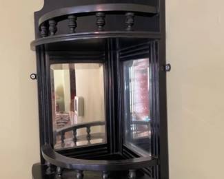 Hanging corner cabinet.