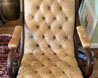 Victorian style tufted upholstered rocker.