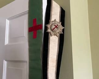 Vintage Masonic Knights Templar Freemason sash with medallion badge and red cross.