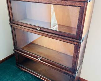 Antique Macey 3-section oak barrister bookcase with original metal wheels