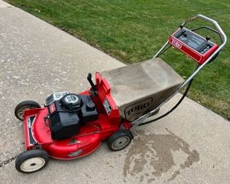 Toro Commercial Deluxe Pow-R-Drive 21” mower with bagger
