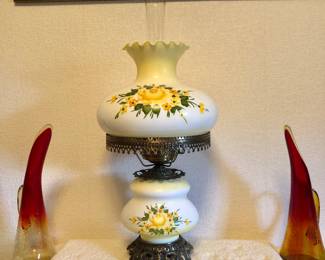 $75 Hurricane Lamp - 2 Available Plus one Matching 
Swag Lamp, $75 each.    Amberina Glass Pitchers $15 each                                                                                           