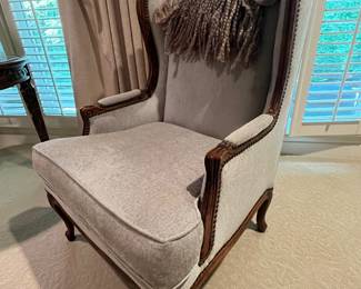 Well crafted high back chairs.  There are two of these.  The material is a grey/blue color that will match most any decor.  