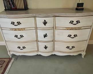 Beautiful French Provincial piece that has been perfectly painted.  The top absolutely looks like marble.  It is a 1950-ish Bassett piece.