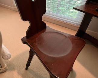 This wooden chair is sold separately, but it looks perfect with the tiny desk.