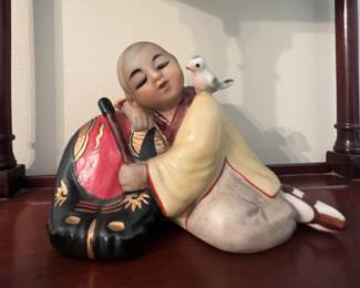 The matte coloring on this, and a few other Asian tchotckes appeal to the senses.