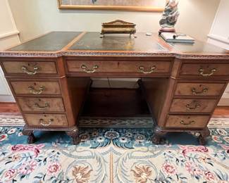 Leather top desk, with clawfoot legs...hmmmm, perfection.  A true show stopper.