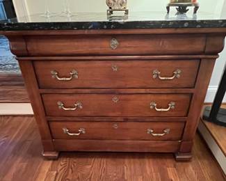 Solid piece with granite top.  Century brand.