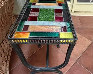 Stained glass, mosaic side table for cocktails.