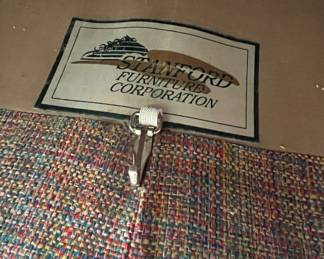 Don't you love the multi-color fabric on this oversized comfy as heck sofa?