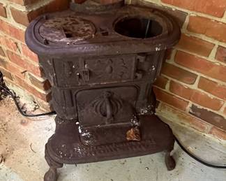 Vintage cast iron stove with claw feet.