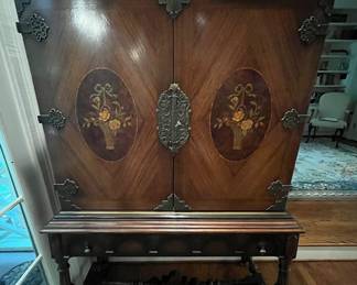 Oh the inlays on this gorgeous chest.  The detailed metal hinges and key fronts.  This piece wants to talk to you!  Boy does it ever.  What a looker she is!