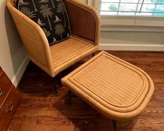This fabulous MCM wicker chair and ottoman has wrought iron claw foot style legs.  These two pieces are in perfect condition.  No holes or tears at all.