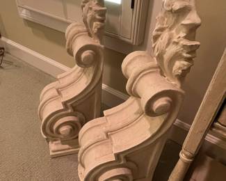 These are two shelves that hang on the wall.  One has a tiny little break in it that is hardly noticeable at all.  It could easily be repaired.