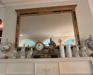 This mirror is inlaid with marble.  An absolute beast of a mirror.  Beautiful details adorn all four sides of it.