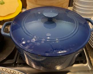 This is a LARGE Cuisinart cast iron dutch oven.  What a great color.  Leave this beauty sitting on your stove as decor and it's ready for use instantly. 